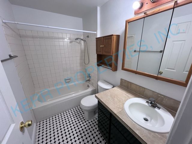 Building Photo - Cozy 2-Bedroom Duplex with Fireplace Charm...