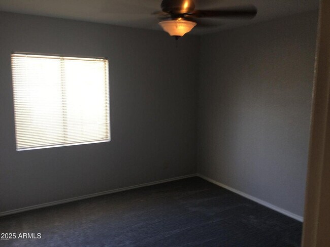 Building Photo - 5623 E Aster Dr