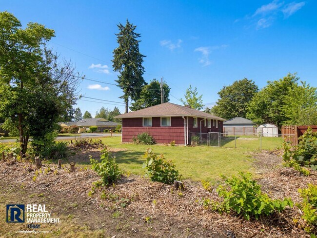 Building Photo - Charming Tacoma Home with Huge Fenced Yard, Garage & Hardwood Floors