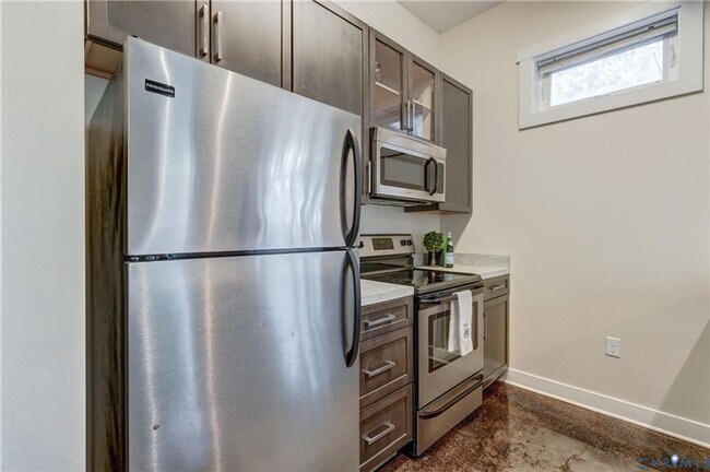Building Photo - Now Available – Partially Furnished Luxury Condo with Rooftop Terrace | Ideal for Incoming VCU St...
