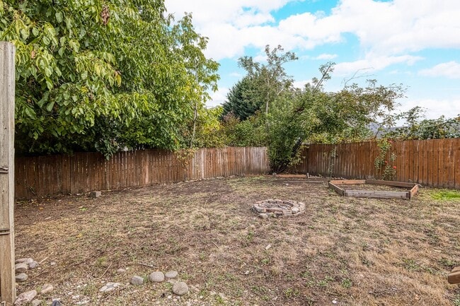 Building Photo - Charming Bungalow with Spacious Loft Suite and Large Backyard