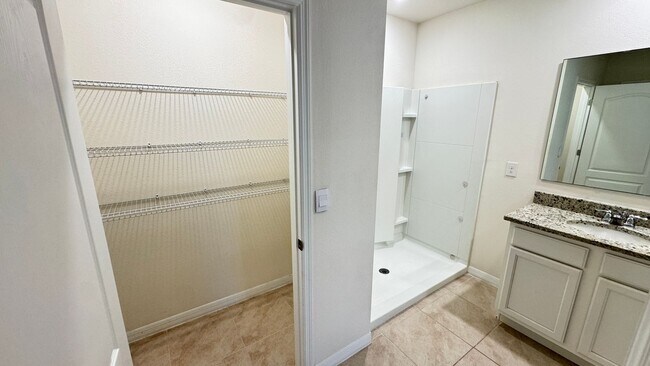 Building Photo - Available NOW! Spacious 4BD/2BA Haven in Villages at Harmony – Your Dream Home Awaits! WASHER & D...