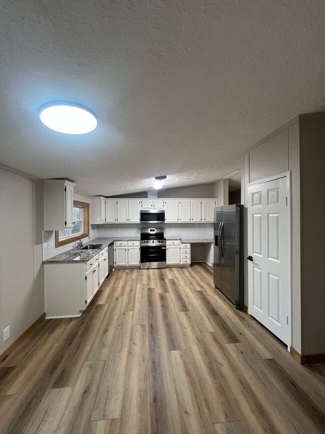 Building Photo - Peaceful Country Living on 1.4 Acres Beautifully Remodeled 3 Bed / 2 Bath Home on Ficklin Road