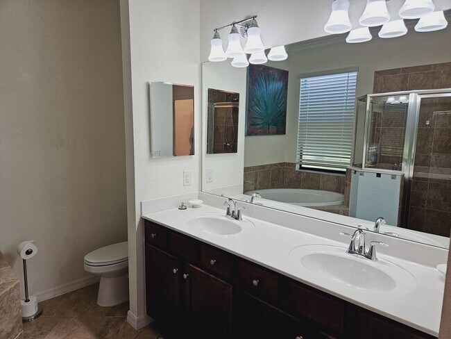 Building Photo - Annual Furnished Pet Friendly Twin Villa l...