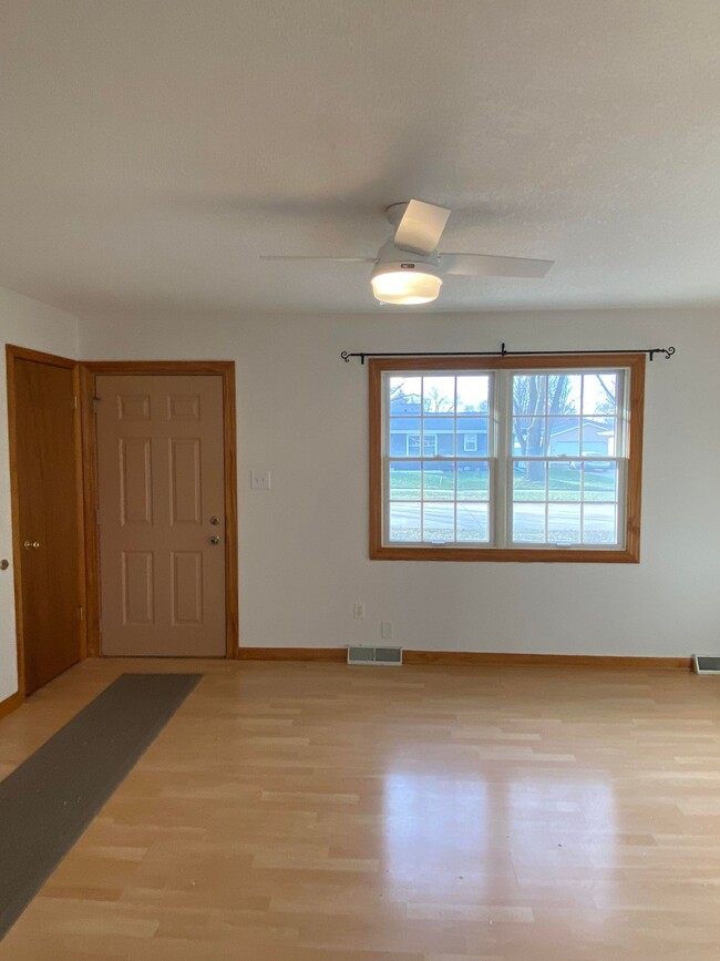 sunny living room with deck off the front - 305 NW Linden St