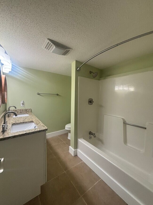 Building Photo - Fully Updated 2BR with Garage, Fenced Yard & Prime Johnson City Location