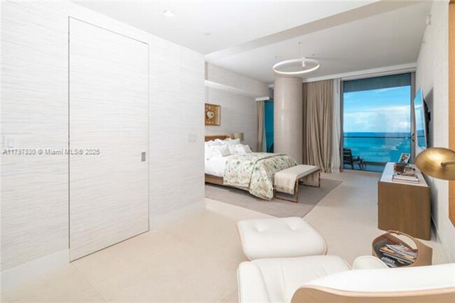 Building Photo - 10201 Collins Ave