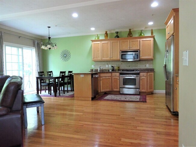 Open floor concept with hardwood floors - 24 Autumn Ln