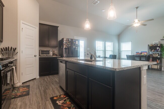 Building Photo - Gorgeous Two Story Home Featuring 2 Living spaces, 5 Bedrooms, and 3.5 Baths