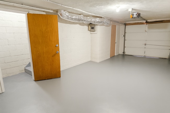 Building Photo - ???Move in Special: No Rent until January!!??? - 2BR/1BA Townhome with Attached Garage and W/D Ho...