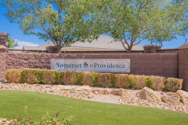 Building Photo - Single Story w/ duel primary suites gated ...