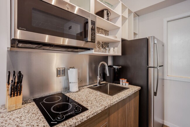 Building Photo - 9-JAN-JAN E 4th St