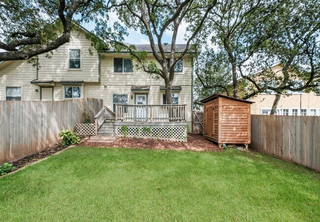 Building Photo - Modern Elegance: 3-Bedroom Townhome with Wood Flooring, Shaded Deck, and Inclusive Amenities