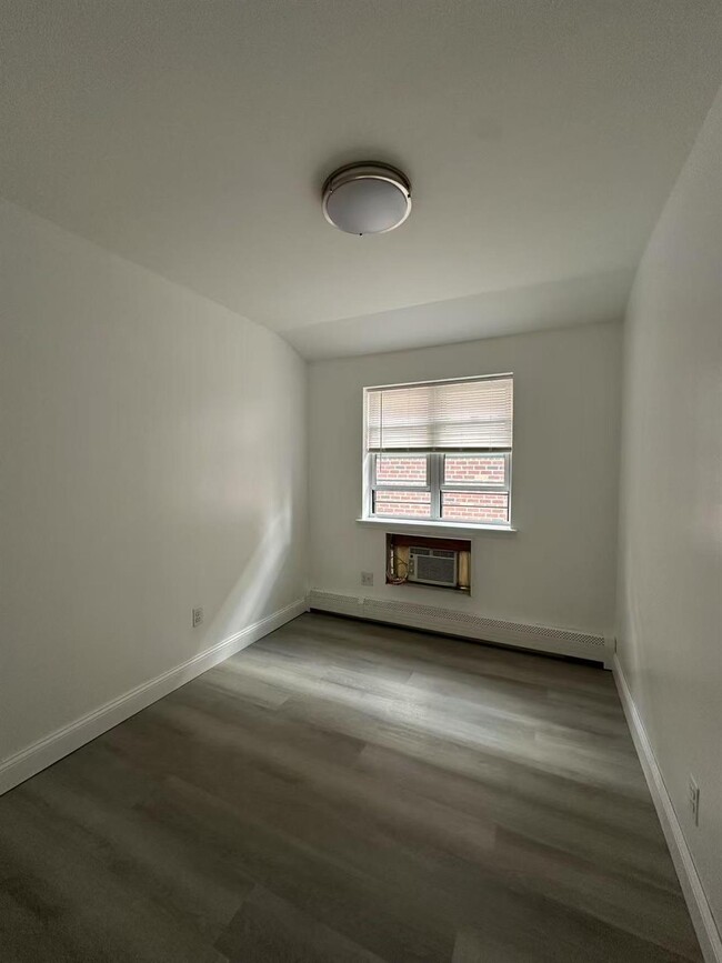 Building Photo - 66-15 52nd Ave