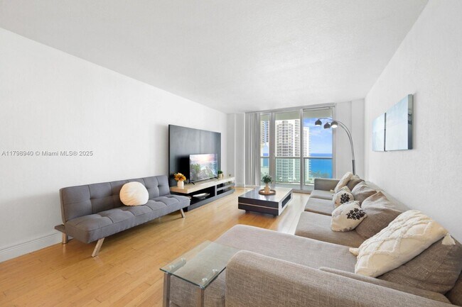 Building Photo - 19370 Collins Ave