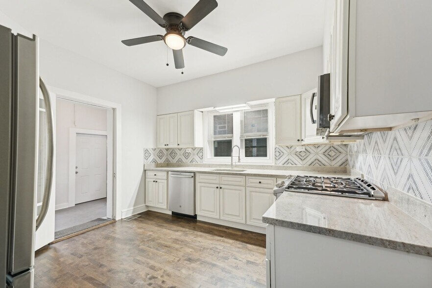 Building Photo - 8423 S Colfax Ave