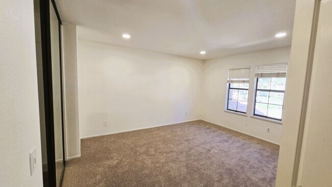 Building Photo - "Spacious, Sunlit Home in a Peaceful Ranch...