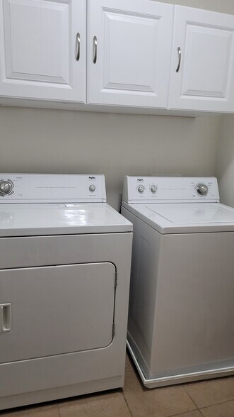 Washer and dryer are in unit on the 2nd floor between the two bedrooms for ease of access. - 4408 Tuscan Loon Dr