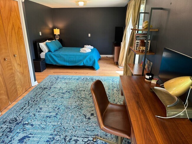 Building Photo - large modern home with big backyard, peace...