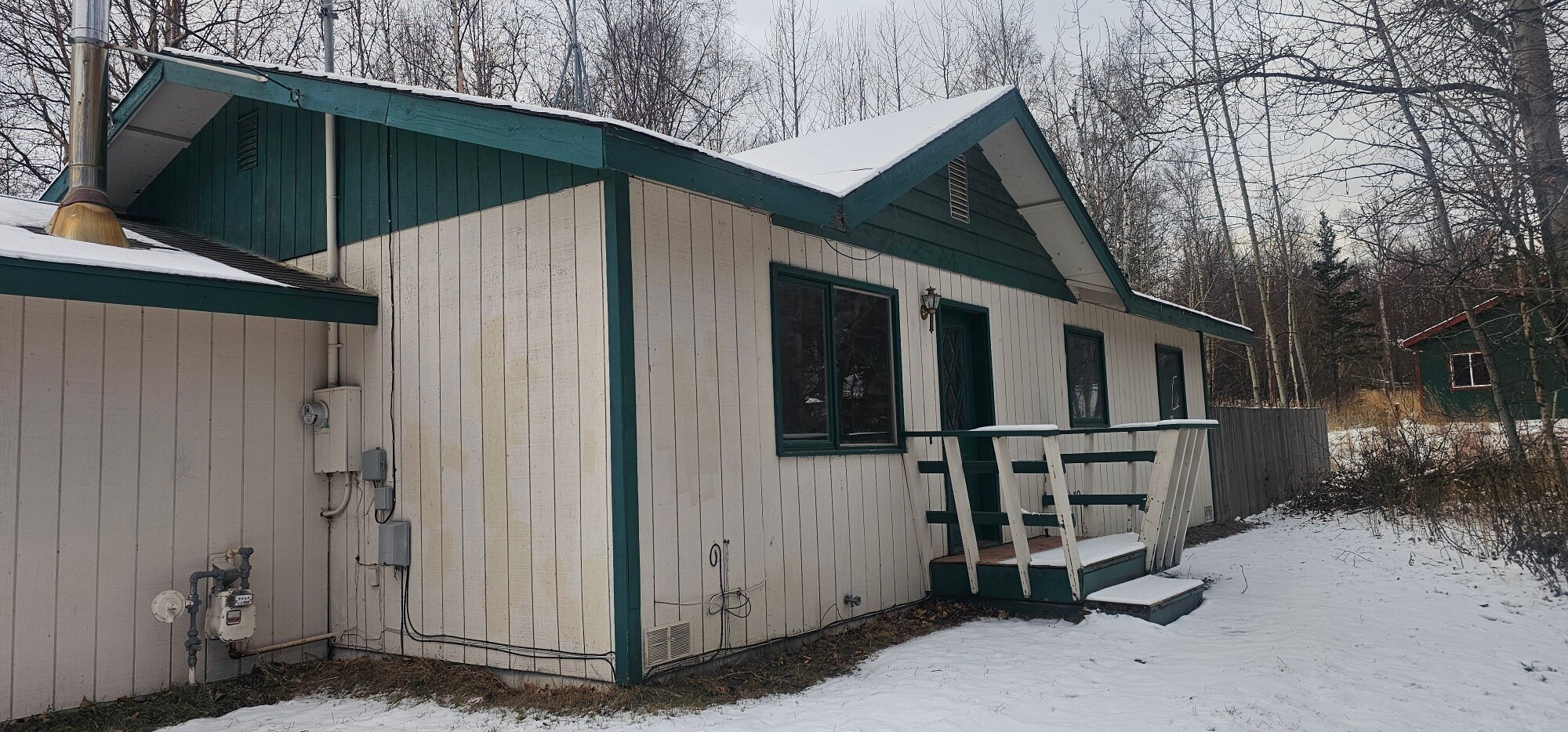 Front of the home with small porch - 1352 N Pioneer Peak Dr