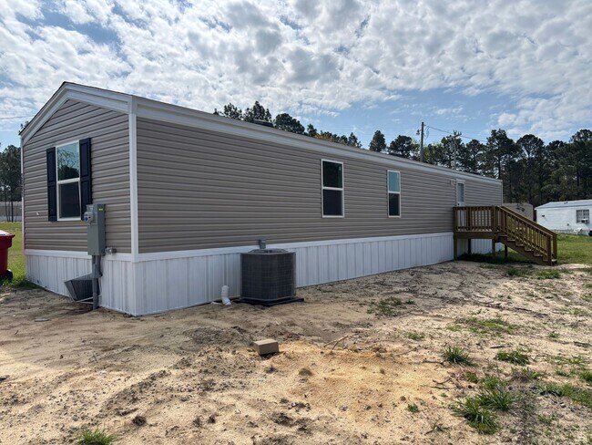 Building Photo - BRAND NEW 3 BED, 2 BATH MOBILE HOME IN PARK LOCATED IN EAGLE SPRINGS