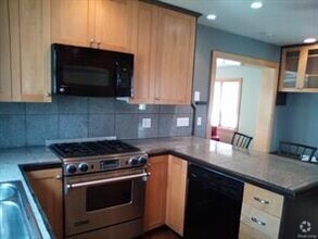 Building Photo - Affordable living Downtown Rochester hardw...