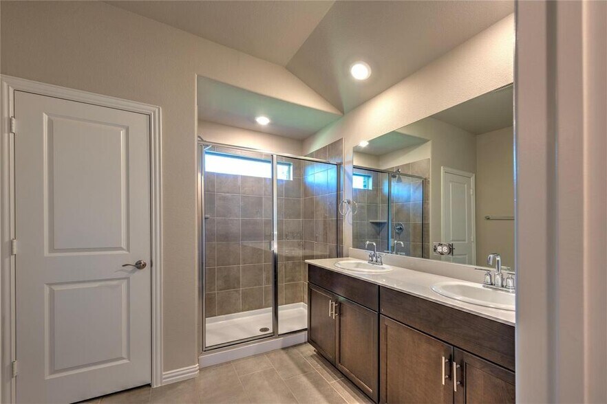 Master bathroom with double vanity and shower cabin - 1109 Birchwood Ln
