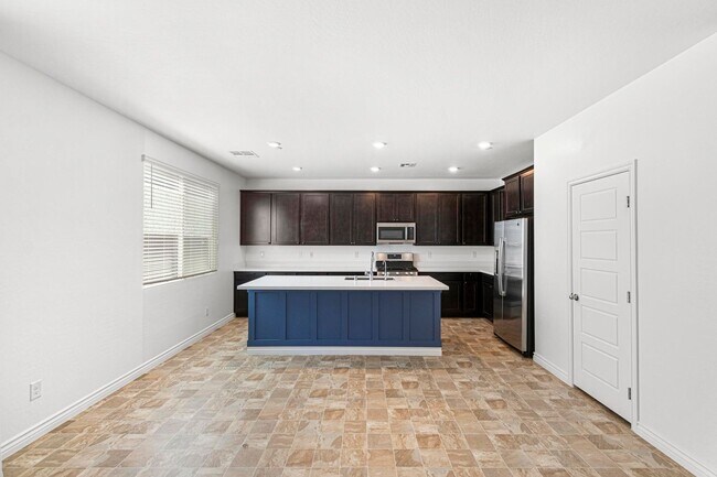 Building Photo - Modern 4-Bedroom Home in Gated Henderson Community | Built 2022