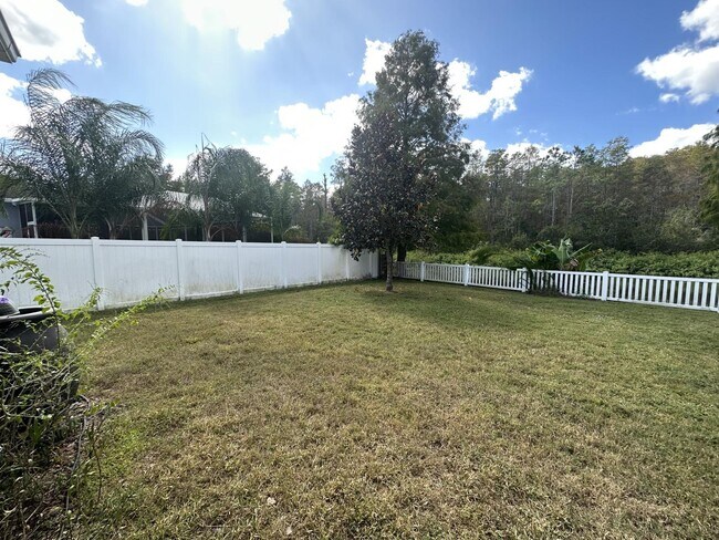 Building Photo - "Spacious 5-Bedroom Retreat with Scenic Views in The Verandahs!"