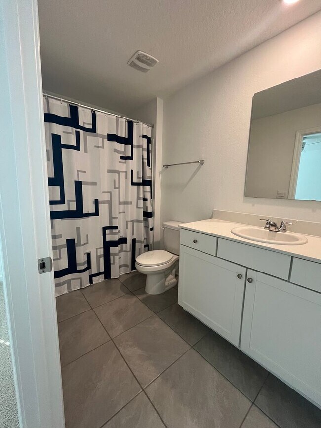 Building Photo - Town Home in The Trails -2 Primary Suites!!