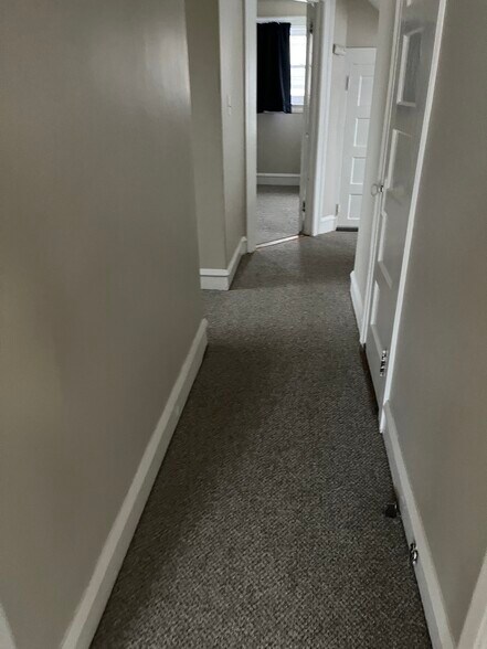 Hallway from living room to bathroom, kitchen and bedroom - 784 Farmington Ave