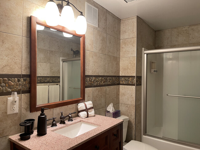 Fully Tiled Bathroom with Independent Heat & Vent - 336 Chunns Cove Rd