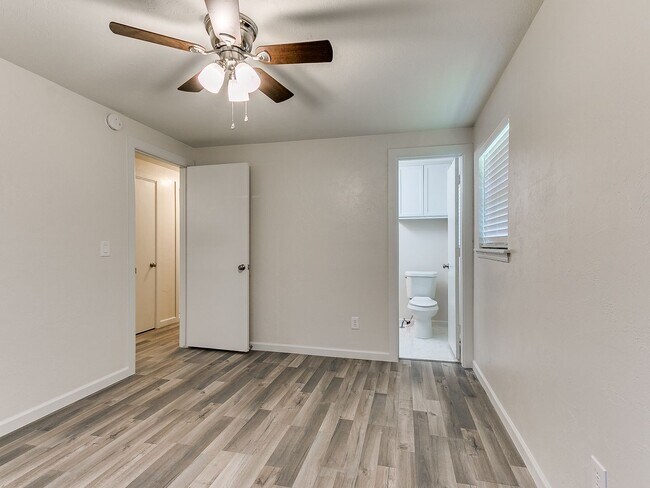 Building Photo - 4 Bedroom/2 Bath home with fenced yard.