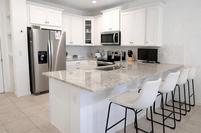 Building Photo - 8913 Matriarca Aly