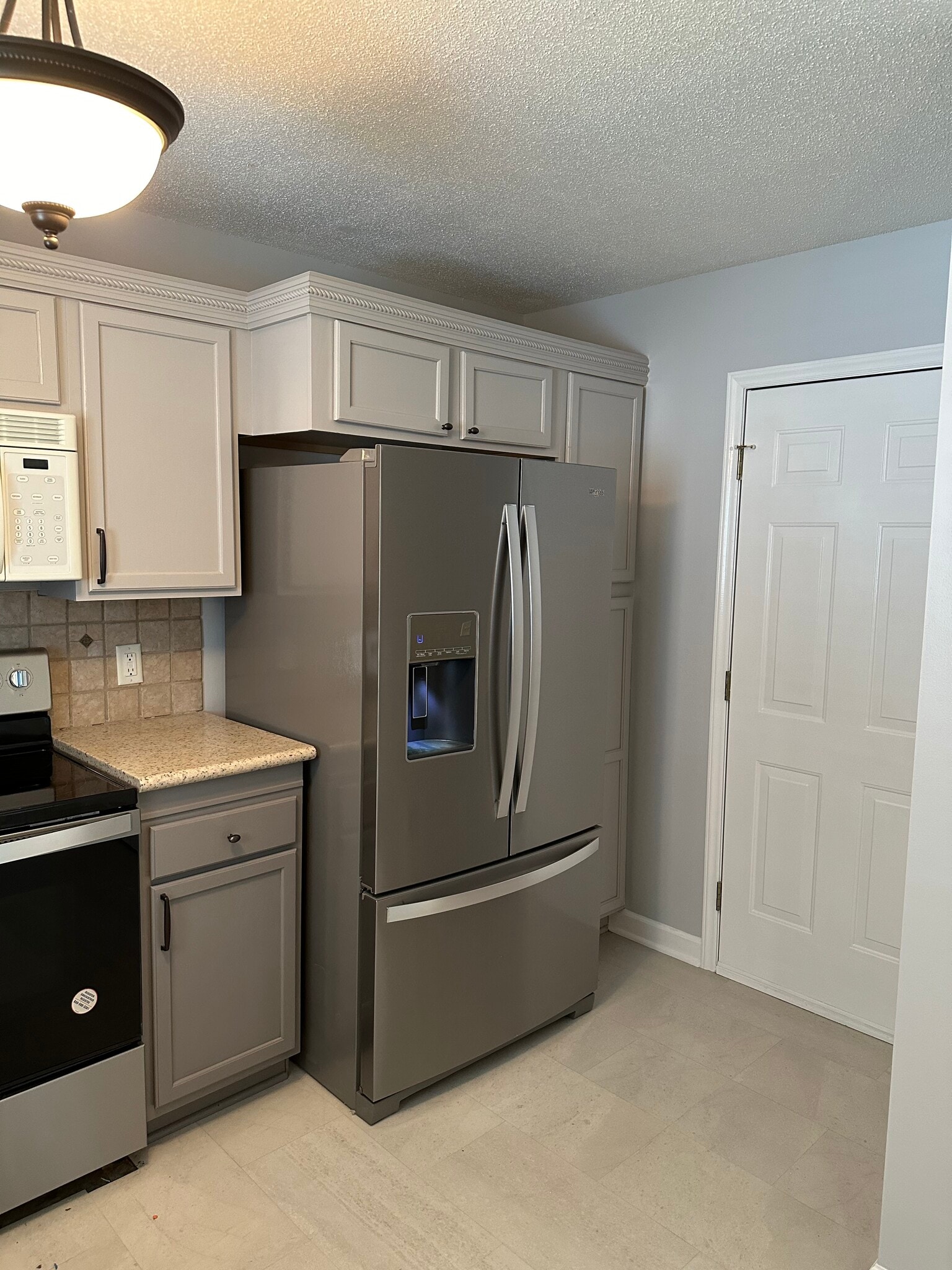 Whirlpool top of the line fridge - 1524 Hawkcrest Ln