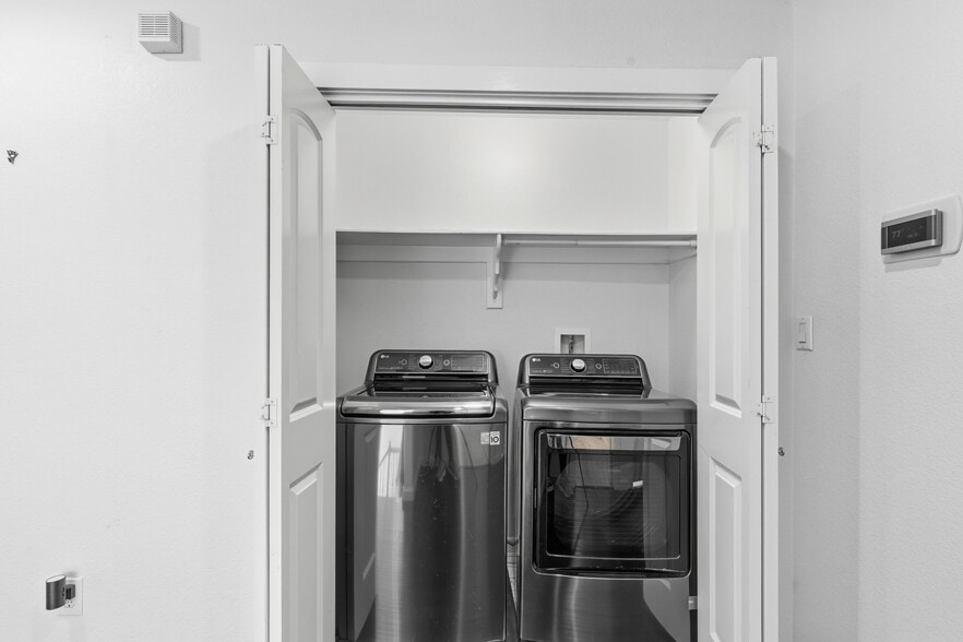 Washer and Dryer are upstairs by all three bedrooms - 2610 Hidalgo St