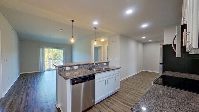 Building Photo - RENT SPECIAL: 1 month FREE! Condo Style Upper 3 Bedroom 2 Bathroom plus Den Apartment Available