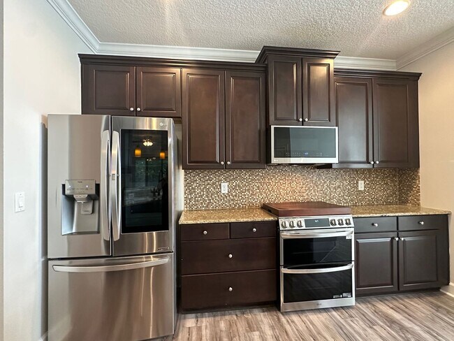 Building Photo - 4/4 Plus Office, Plus In-Law Suite/Gate Se...