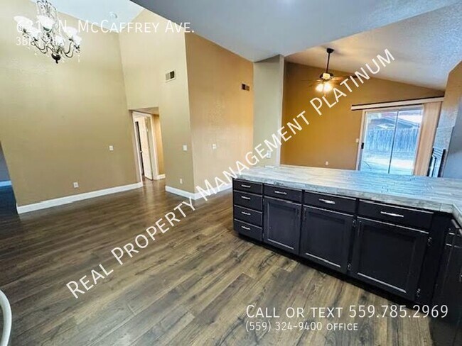 Building Photo - 6215 N McCaffrey Ave