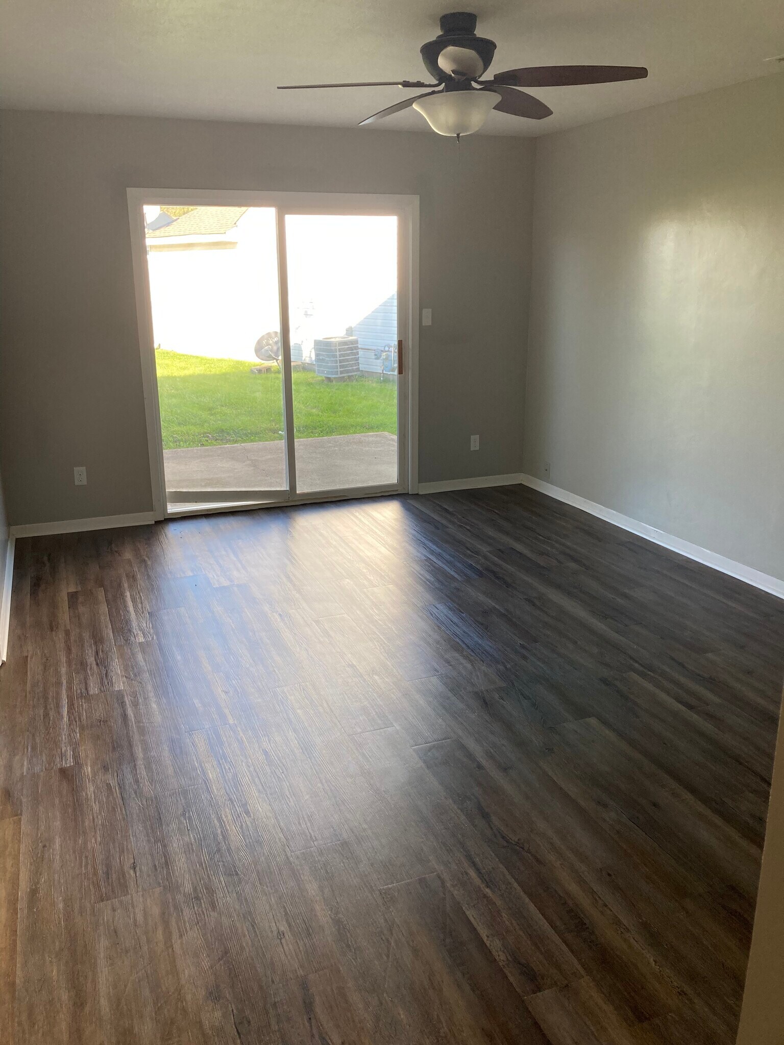 Downstairs living room leading to backyard - 1080 Fairlane Ct