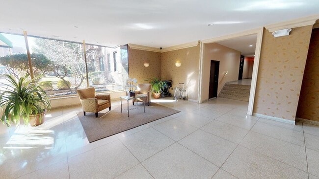 Building Photo - 10025 Queens Blvd