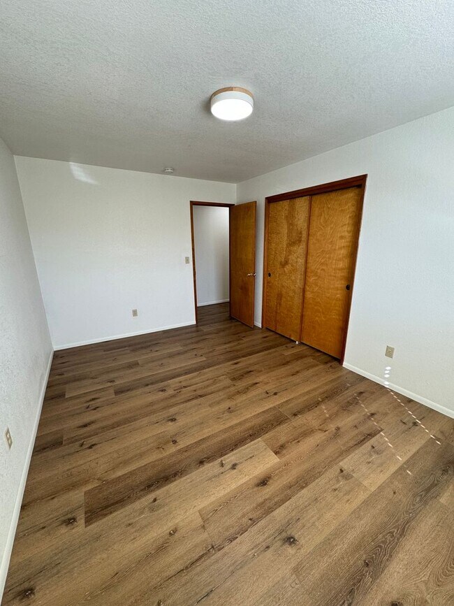 Building Photo - Newly Renovated Farmhouse style unit with new mini split for heating and cooling and garage