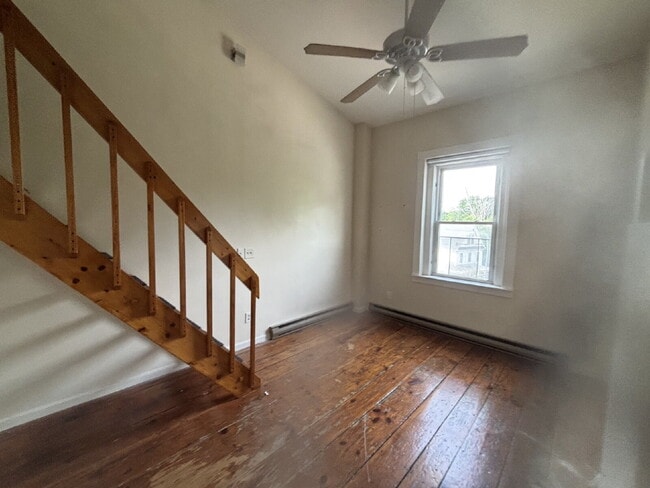Building Photo - Charming Studio Loft Living with High Ceilings & Classic Hardwood Floors!