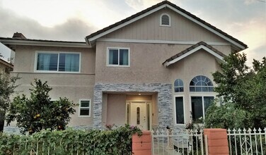 Building Photo - 4 Bedrooms, 3 Baths, 2,809 sq. ft. Home in Canoga Park