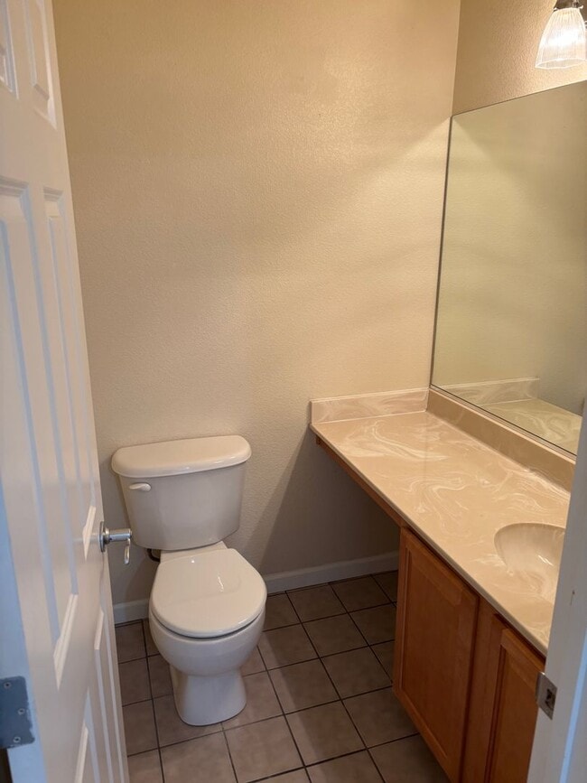 Building Photo - 2 bed - 2.5 bath - 2 car garage Townhome