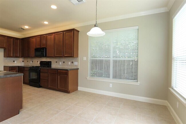 Building Photo - 9603 Red Rugosa Dr