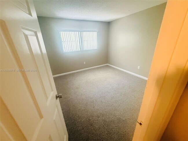 Building Photo - 10787 Royal Palm Blvd