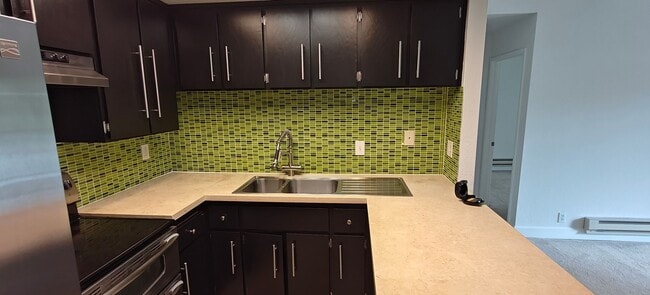Building Photo - Modern 1BR/1BA Condo Available Now