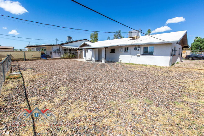 Building Photo - 6415 E Aspen Ave