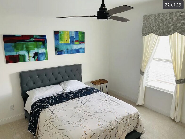 Upstairs bedroom with large walk-in closet - 24719 Resort Pky